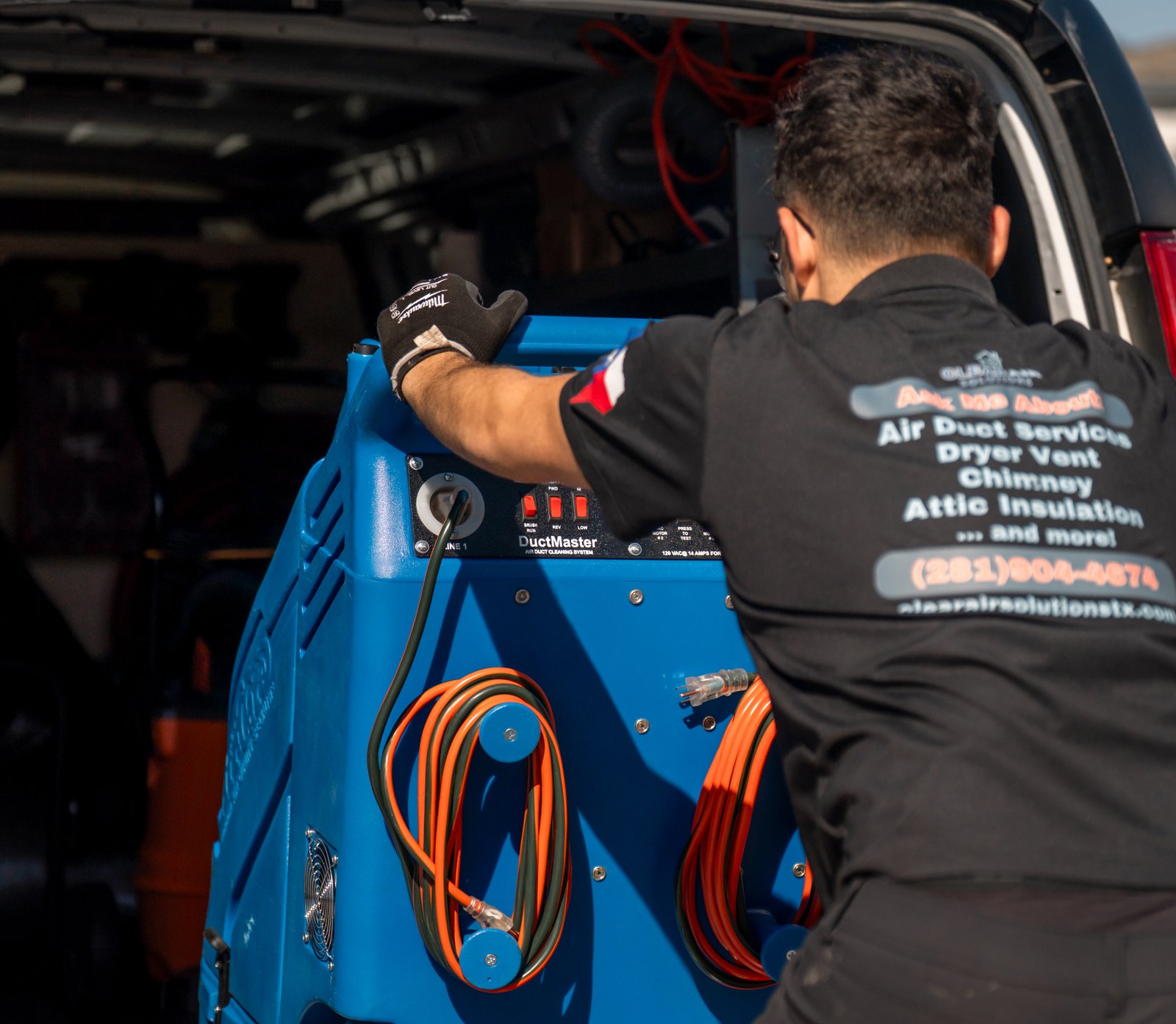 ClearAir Solutions shirt showing services and phone number